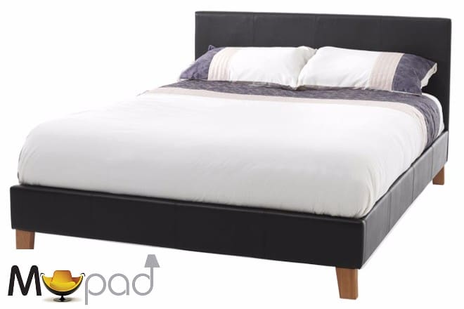 The New Yorker Brown logo